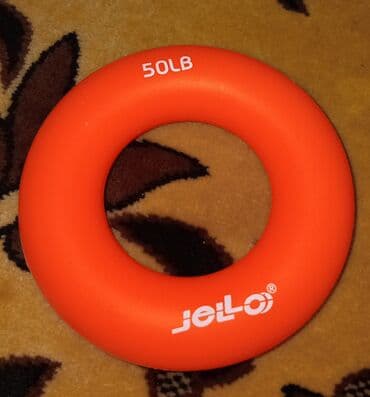 Digər idman və istirahət malları: Məhsul: JELLO əl güc halqası – 50 LB - Rəng: narıncı - Üzərində — 1