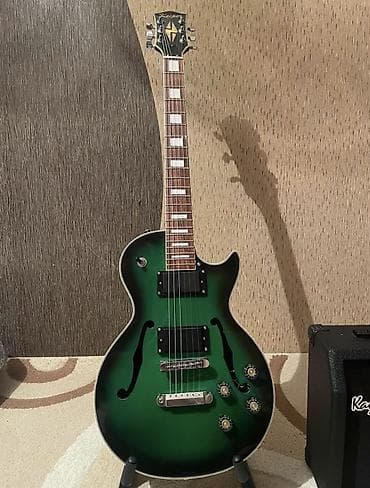 real gitara: Salam les paul növlü elektro gitardır. Heçbir problemi yoxdu, set — 2