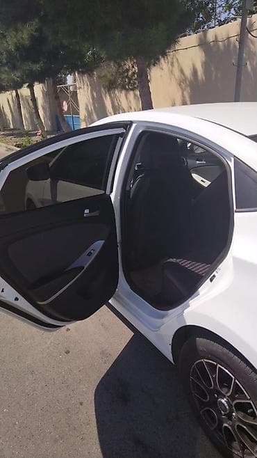Hyundai Accent: 1.6 л | 2014 г. Седан — 10