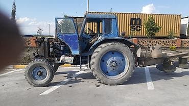 maşın lapeti: Məhsul: Kənd təsərrüfatı traktoru (mavi kabinalı), diskli otbiçən — 1
