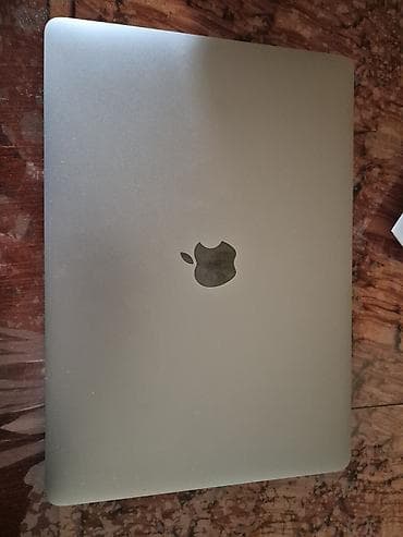 Apple MacBook M1 8 GB ram 256 hafıza. Türkiye'de hala garantisi devam — 2