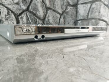 Qulaqcıqlar: LG DVD Karaoke sistemi Xüsusiyyətlər: - Model: LG DVD Karaoke System — 1