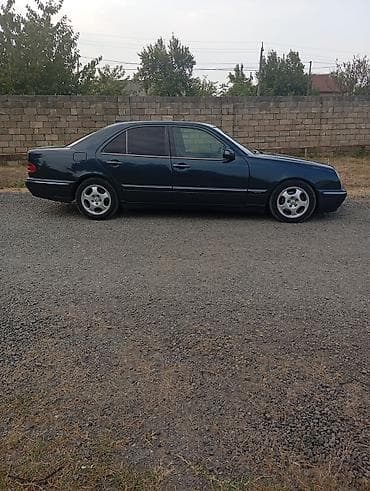 06 diskleri: Mercedes-Benz E-Class: 2.2 l | 1999 il Sedan — 3