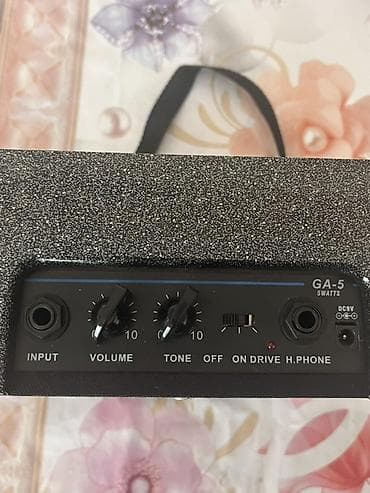 gitara simi: TS GA-5 portativ gitar gücləndiricisi Xüsusiyyətlər: - Güc: 5 Watt — 3