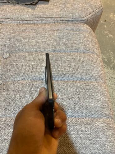 note 14 pro: Xiaomi Redmi smartfon - Arxa paneldə “Redmi” loqolu, düz kənarlı qara — 2