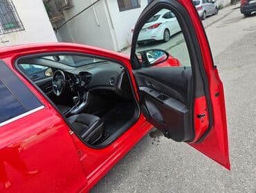 продажа дешевых автомобилей: Chevrolet Cruze LT sedan – parlaq qırmızı rəngdə, qara rəngli 17'' — 10