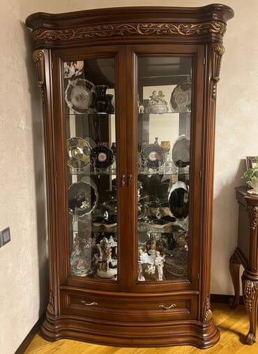 Şüşəli dolab vitrini, İşlənmiş, Ünvandan götürmə