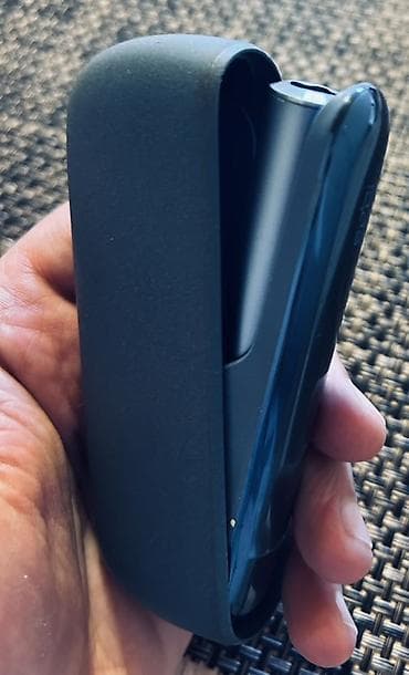 elektron qelyan gence: IQOS cihaz satılır, tünd göy rəngdədir. İkinci əldir, amma çox — 2