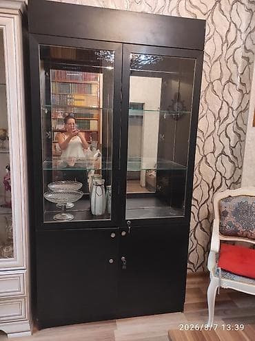 Şüşəli dolab vitrini, İşlənmiş, Ünvandan götürmə