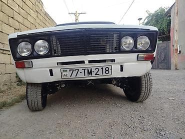 VAZ 2106 sedan, ağ rəng, AZ nömrə nişanı 77-TM-218. Xüsusiyyətlər: -