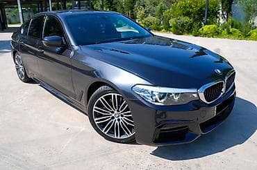bmw e39 lip: BMW 5 Series sedan – qara metalik rəng, dinamiki və zərif dizayn — 1