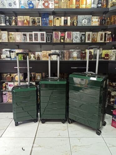 yol cantası: Material polikarbonat.S-50azn. M-80azn. L-110azn Camadan — 1