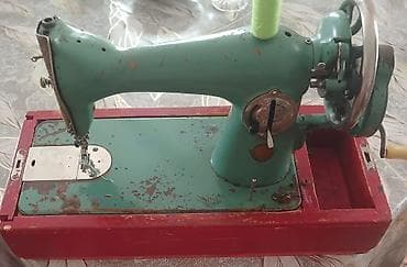 Mexanik tikiş maşını - Klassik, əl ilə çevrilən fırlatma çarxı