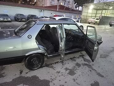 uaz 469 satisi: Model: Tofas Şahin (sedan) Rəng: Boz/metalik tünd ton Kuzov: 4 qapılı — 4