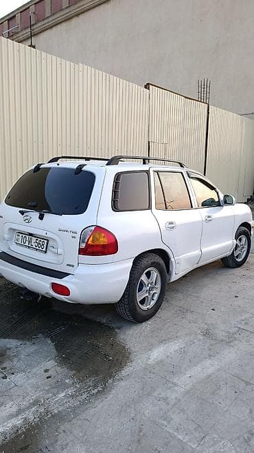 mitsubishi 2002 montero: Hyundai Santa Fe: 2.4 l | Krossover — 10