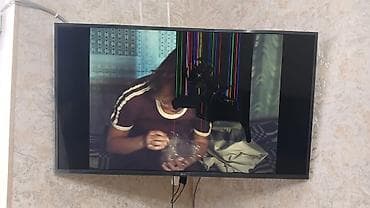 heyetlerin dizayni: LG LED TV – 43 düym (təxminən) - Divar asqısı ilə birlikdə - İncə — 1