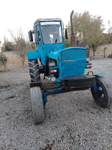 maz yuk masini: Mavi rəngli tək kabinəli təkərli kənd təsərrüfatı traktoru - Güclü — 8