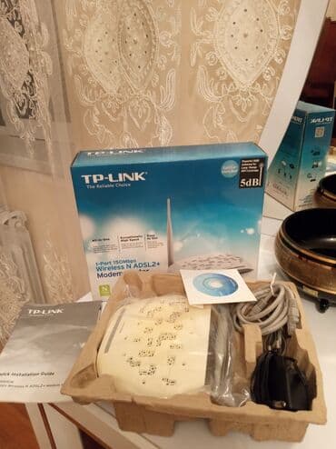 router: TP-LINK
1-Port 150Mbps
Wireless N ADSL2+
Modem Router — 3