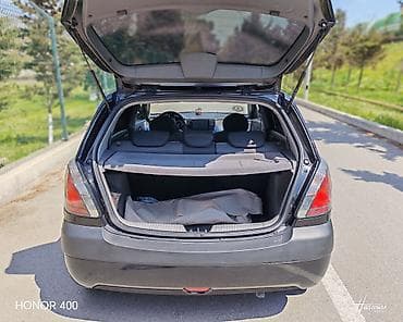 təkər satsi: Kia Rio: 1.4 l | 2006 il Sedan — 8