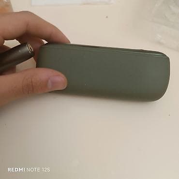 acki sekilleri: IQOS elektron tütün qızdırma cihazı – yaşıl rəng Xüsusiyyətlər: - — 4