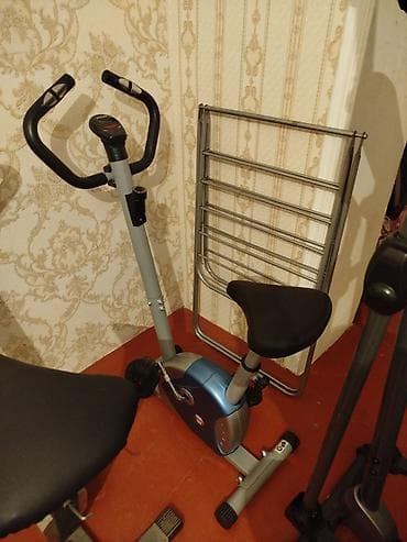 forma az: Evdə məşq üçün nəzərdə tutulmuş stasionar məşq velosipedi. Bu — 1