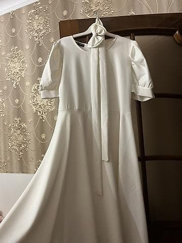 Aksesuarlar: Ağ rəngli zərif qadın donu - Dizdən aşağı, A-kəsim ətəkli model – — 1