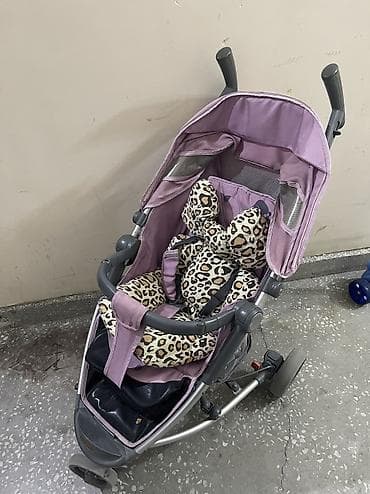 araba: Uşaq arabası – tünd bənövşəyi rəngdə, leopard naxışlı yumşaq oturacaq — 1