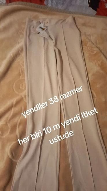 Qadın şalvarları – flared (küləkli) kəsim - Ölçü: 38 - Rənglər: krem