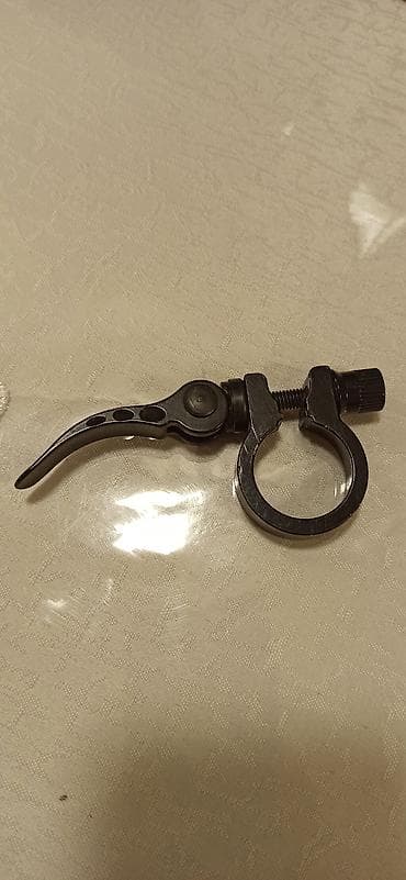 veli: Velosiped oturacaq borusu üçün tezburaxan sıxacaq diametri ölcü 2.7sm — 2