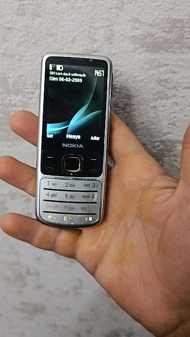 sony t28: Nokia 6700 Slide, < 2 GB Memory Capacity, rəng - Boz, Düyməli — 5