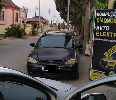 passat diskleri: Opel Astra Caravan (universał) – qara rəngdə, benzinli Xüsusiyyətlər — 2