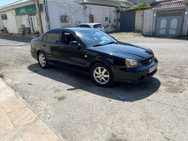 Чехлы: Chevrolet Evanda: 2 л | 2005 г. 300000 км Седан — 4