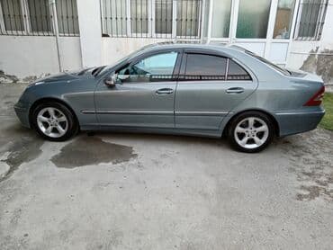 e 200: Mercedes-Benz 200: 1.8 l | 2006 il Sedan — 4