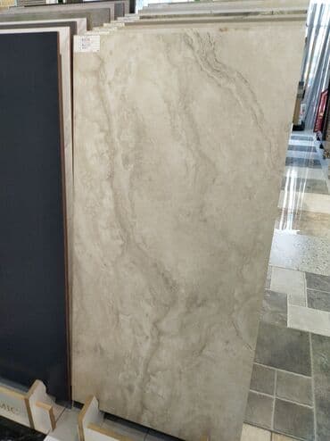 Alçipan: 40x60 sm ölçüsündə, müxtəlif dizaynlarda keramika plitələri. Bu — 3