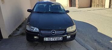 Su nəqliyyatı: Opel Omega B sedan - Kuzov: sedan, qara rəng - Mühərrik: benzin - — 2
