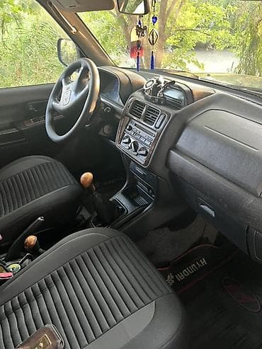 maşın satış: Mitsubishi Pajero iO – 5 qapı, kompakt off-road SUV Xüsusiyyətlər: - — 3