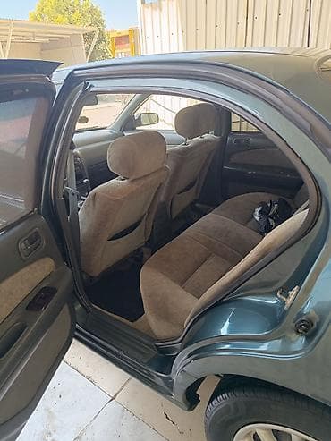 Nəqliyyat: Nissan Maxima: 2.4 l | 1998 il Sedan — 7