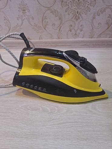 tefal utuler: Buxarlı ütü – sarı/qara dizayn Xüsusiyyətlər: - Titan örtüklü — 1