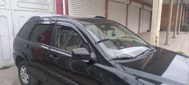 teker niva: Kia Sportage: 2 l | 2008 il Ofrouder/SUV — 8