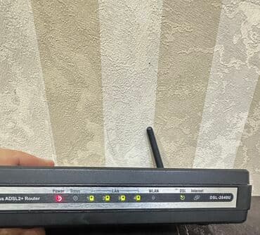 Subaru: D-Link DSL-2640U modelindən olan simsiz ADSL2+ router. Evdə və ya — 2