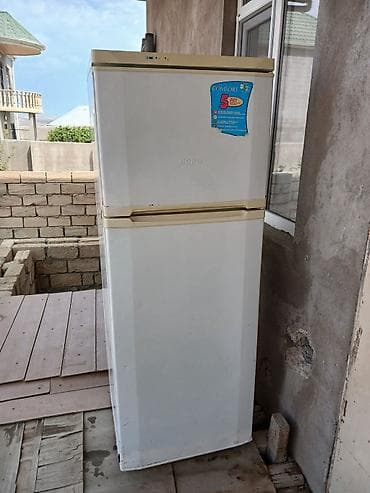 ağ qulaq: NORD ikiqapılı soyuducu - Üstdə dondurucu, altda soyuducu bölmə - — 1