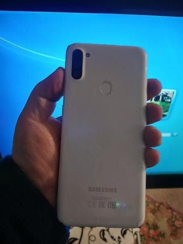 Видеоигры и приставки: Samsung Galaxy A11, цвет - Белый, Отпечаток пальца — 4