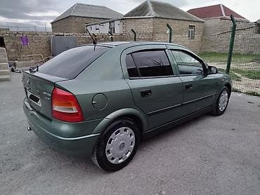 formula tekerler: Opel Astra: 1.8 l | 1999 il 250000 km Sedan — 10