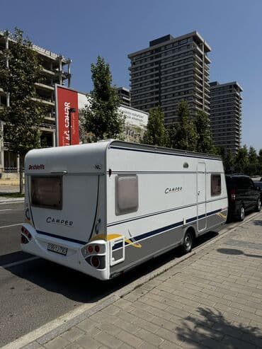qoşqu mala: Yeni gelib Azerbaycana Ili 2005 Yeni kimidir! Butun funksiyalari — 1