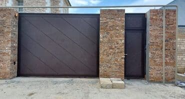 чугунная ванна продать: Naxışlı, qara rəngli ikiqapılı dəmir darvaza, üstündə və qapılarında — 5