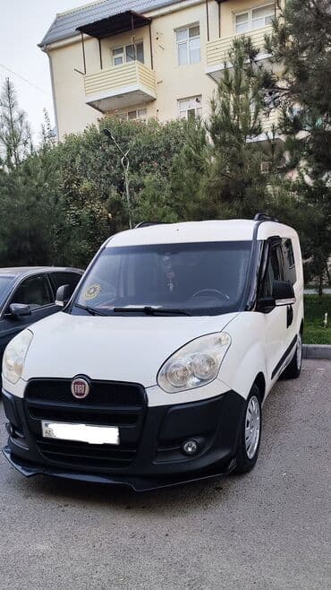 qosqu satilir: Fiat Doblo: 1.4 l | 2012 il 262000 km Van/Minivan — 1