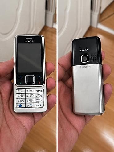 Nokia 2 GB, rəng - Gümüşü, Düyməli