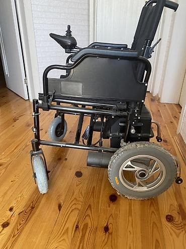 elil araba: Elektrik təkərli kürsü - Yan konsolda joystick idarəetmə paneli — 1