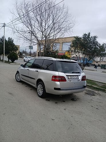 06 ucuz: Fiat Stilo: 1.9 l | 2004 il 30070 km Universal — 2