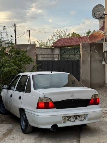 maşın satışı bmw: Daewoo Nexia, ağ rəngli sedan. Xarici:heç bir prablemi yoxdur real — 14